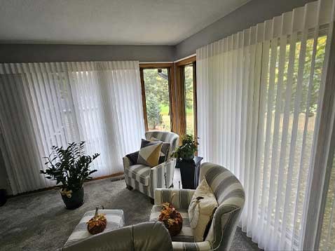 Cozy sitting room showcasing hanging shades